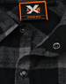 A black and grey plaid unisex flannel button-up shirt featuring snap buttons and a logo tag.