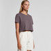 A cropped t-shirt in a muted purple colour, featuring a round neckline and short sleeves, paired with light shorts. A cropped t-shirt in a muted purple colour, featuring a round neckline and short sleeves, paired with light shorts.
