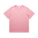 A pink T-shirt featuring a classic crew neck design. The shirt has a brand logo on the label.