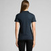A navy polo shirt with a short collar and fitted design, viewed from the back on a model. A navy polo shirt with a short collar and fitted design, viewed from the back on a model.