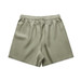 Linen shorts in a soft green hue with an elastic waistband, featuring a simple, smooth design. Linen shorts in a soft green hue with an elastic waistband, featuring a simple, smooth design.