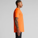 An orange work t-shirt displayed from the side, featuring a simple design and a logo on the chest. An orange work t-shirt displayed from the side, featuring a simple design and a logo on the chest.