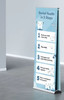 A double-sided pull-up banner, 850mm x 2000mm, featuring a blue design and dental health tips. It includes a logo.