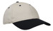 A cap featuring a cream body and a black brim, designed with ventilation holes and a logo.