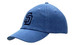 A cap in washed denim blue featuring a logo on the front. The design includes a curved peak and ventilation holes.