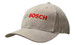 A beige cap with a contrasting peak, featuring a logo on the front.