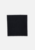 A square swatch of fabric in black with a zigzag edge, featuring a logo in the corner.