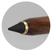 A metal pen with a wooden finish and a black writing tip, featuring a gold band near the tip. A metal pen with a wooden finish and a black writing tip, featuring a gold band near the tip.