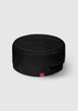 A black mesh flat top hat featuring a gathered back and a logo tag. Suitable for various headwear needs.
