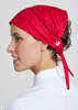 A red chef bandana with a tied back design, featuring a logo, worn by a person in a white chef uniform. A red chef bandana with a tied back design, featuring a logo, worn by a person in a white chef uniform.