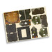 A wooden model kit featuring various parts in dark brown and green, with Halloween-themed designs and a logo.