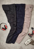 Three pairs of Men's Streetworx Curved Cargo Pants in black, navy, and beige, displayed with work tools and accessories. Three pairs of Men's Streetworx Curved Cargo Pants in black, navy, and beige, displayed with work tools and accessories.