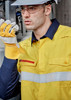 A lightweight work shirt in yellow and navy, featuring hoop tape, worn by a model with safety gear. A lightweight work shirt in yellow and navy, featuring hoop tape, worn by a model with safety gear.