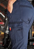 Navy blue work pants with utility pockets, designed for durability and functionality, featuring a pencil holder on the side. Navy blue work pants with utility pockets, designed for durability and functionality, featuring a pencil holder on the side.