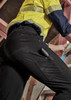 Men's lightweight outdoor cargo pants in black, featuring pockets and a fitted design. Suitable for various activities.