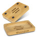 A bamboo soap holder with black rubber feet, featuring a channel design and a logo. Comes in a natural bamboo finish.