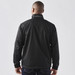 A black jacket with a high collar and branding on the back, featuring a simple and sleek design.