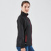 A black women's rain jacket with red accents, featuring a zippered front and side pockets, and a logo on the fabric.