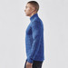 A men's blue thermal 1/4 zip jumper viewed from the side, featuring long sleeves and a high collar.