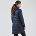 A navy women's parka with a hood, featuring a quilted design and a mid-length cut, displayed from the back.