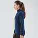A navy women's fleece jumper with a quarter zip and a side pocket, featuring a fitted silhouette and long sleeves.