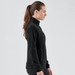 A women's black fleece jumper featuring a quarter zip and a fitted design, with a logo on the chest.