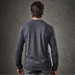 A long-sleeve henley shirt in dark grey, featuring a simple design and a logo on the back.