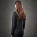 A long-sleeve black henley shirt featuring a fitted style and a smooth fabric finish, with a logo on the back.
