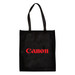 A large black shopping tote bag with a gusset and a logo in red. It features two sturdy handles. A large black shopping tote bag with a gusset and a logo in red. It features two sturdy handles.