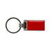 A red keychain with a rectangular design and a metallic ring attachment. The keychain includes a logo.
