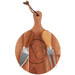 A round wooden cheeseboard with a branded logo, featuring a cheese knife and fork with wooden handles.