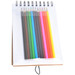 A sketch pad with a clear cover, featuring ten coloured pencils in various shades, including pink, green, and yellow. A sketch pad with a clear cover, featuring ten coloured pencils in various shades, including pink, green, and yellow.