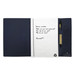 A large A5 journal book with a dark blue cover, featuring lined pages and a pen holder. A large A5 journal book with a dark blue cover, featuring lined pages and a pen holder.