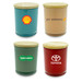 Four medium candles with wooden lids in teal, cream, olive green, and burgundy, each featuring different brand logos. Four medium candles with wooden lids in teal, cream, olive green, and burgundy, each featuring different brand logos.