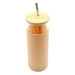 A drink bottle with a peach-coloured silicone sleeve, glass body, bamboo lid, and stainless steel straw.