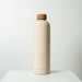 A drink bottle in a soft beige colour with a brown lid, featuring a smooth matte finish and a logo. A drink bottle in a soft beige colour with a brown lid, featuring a smooth matte finish and a logo.