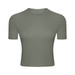 A short sleeve yoga top in a soft green colour featuring a simple design and a logo on the front.