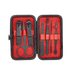 A black manicure set with red lining, featuring scissors, clippers, and various grooming tools in a compact case. A black manicure set with red lining, featuring scissors, clippers, and various grooming tools in a compact case.