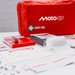 A red first aid kit with various contents including bandages, a notebook, scissors, and safety pins, featuring a logo. A red first aid kit with various contents including bandages, a notebook, scissors, and safety pins, featuring a logo.