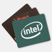 Three fabric mouse mats in various designs and colours, including one with an Intel logo. Three fabric mouse mats in various designs and colours, including one with an Intel logo.