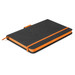 A notebook with a black cover and an orange elastic band, featuring a sleek design and a bookmark. A notebook with a black cover and an orange elastic band, featuring a sleek design and a bookmark.