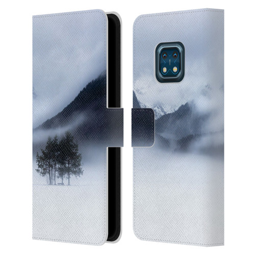 Patrik Lovrin Magical Foggy Landscape Fog, Mountains And A Tree Leather Book Wallet Case Cover For Nokia XR20