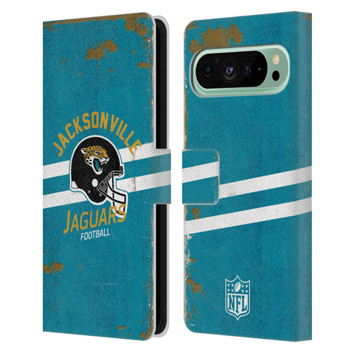 NFL Jacksonville Jaguars Logo Art Helmet Distressed Leather Book Wallet Case Cover For Google Pixel 9 Pro XL
