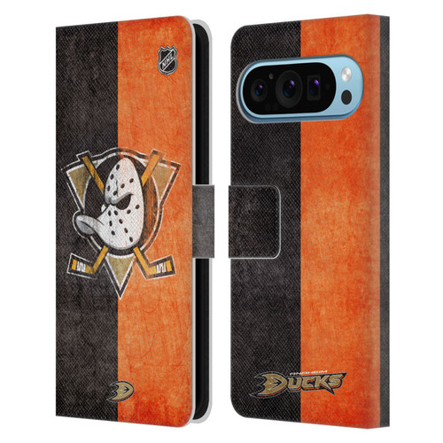 NHL Anaheim Ducks Half Distressed Leather Book Wallet Case Cover For Google Pixel 9 / Pixel 9 Pro NHL Anaheim Ducks Half Distressed Leather Book Wallet Case Cover For Google Pixel 9 / Pixel 9 Pro