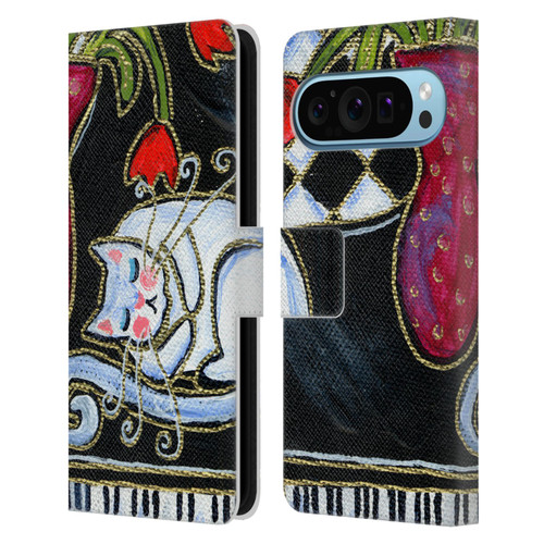 Wyanne Cat Kitty Asleep On The Piano Leather Book Wallet Case Cover For Google Pixel 9 / Pixel 9 Pro