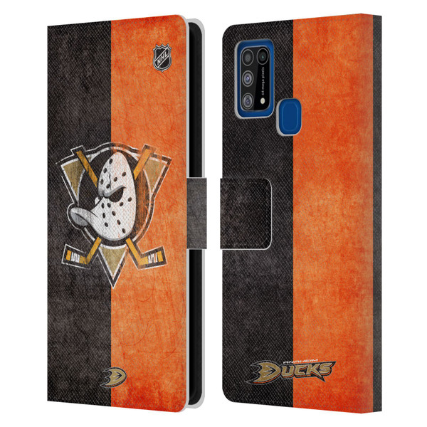 NHL Anaheim Ducks Half Distressed Leather Book Wallet Case Cover For Samsung Galaxy M31 (2020)