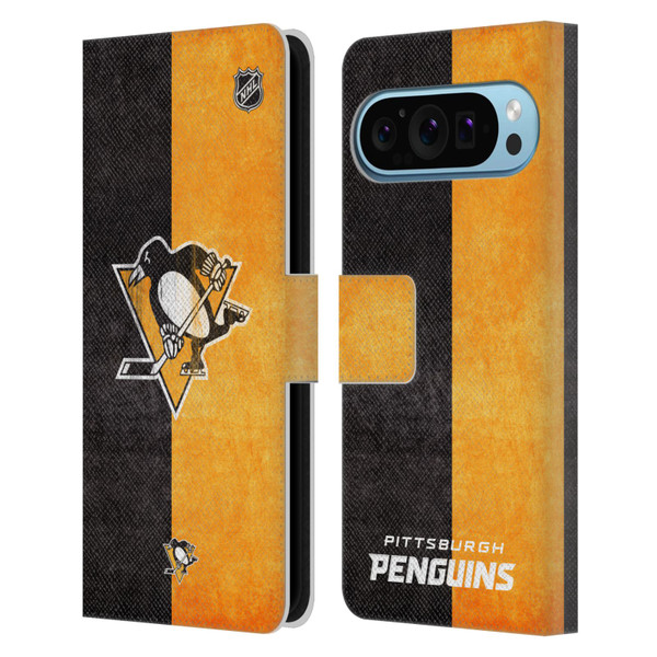 NHL Pittsburgh Penguins Half Distressed Leather Book Wallet Case Cover For Google Pixel 9 / Pixel 9 Pro