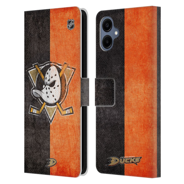 NHL Anaheim Ducks Half Distressed Leather Book Wallet Case Cover For Samsung Galaxy A06 4G NHL Anaheim Ducks Half Distressed Leather Book Wallet Case Cover For Samsung Galaxy A06 4G