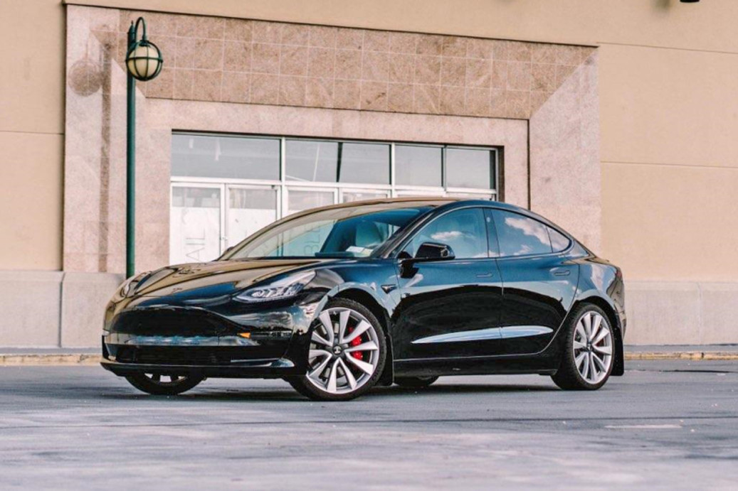 Rally Armor 17-22 Tesla Model 3 Black UR Mud Flap - Metallic Black Logo - MF62-UR-BLK/MBK User 1