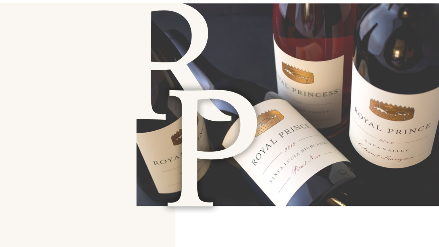 Royal Prince wine bottles and labels arranged with the RP monogram
